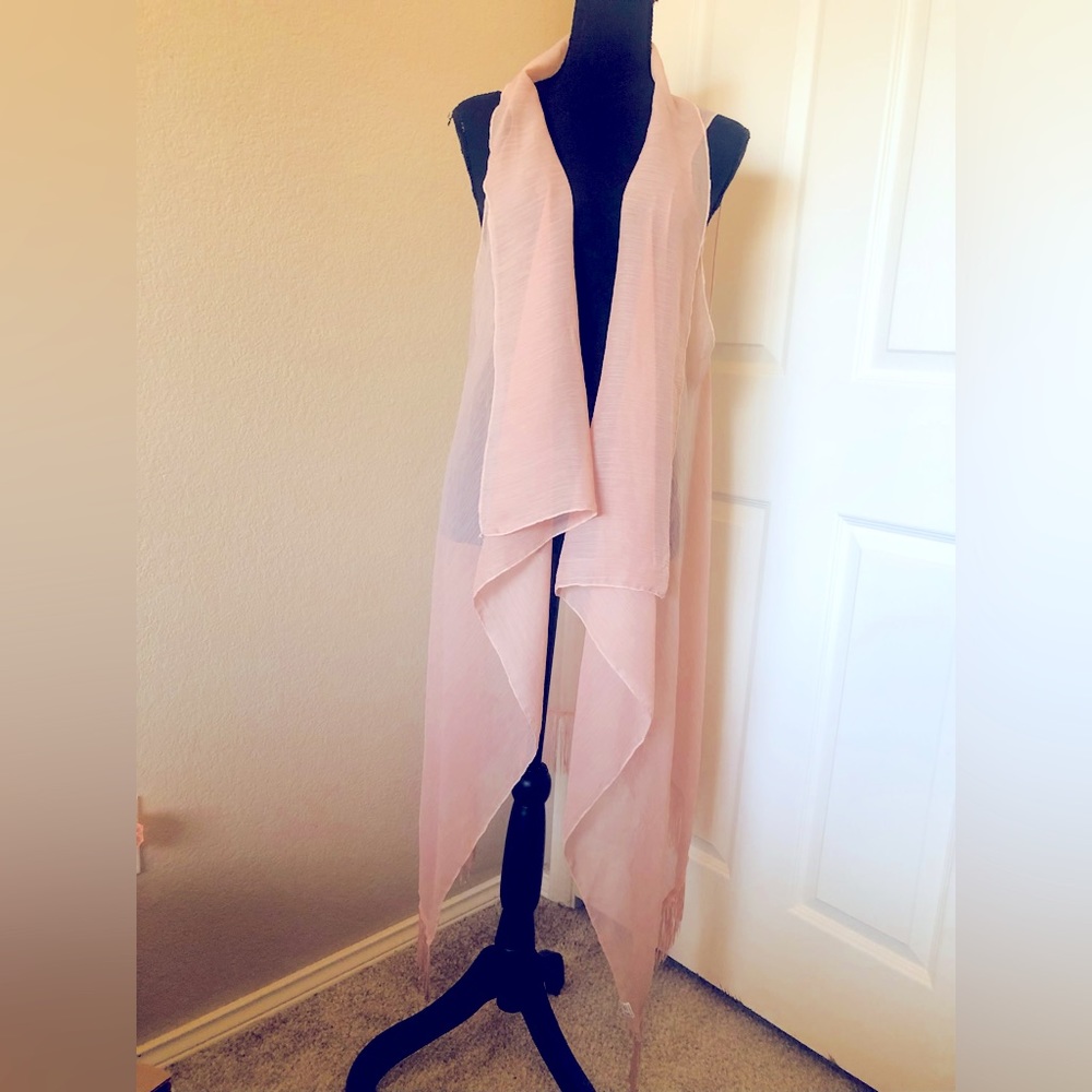 Long peachy ,pink ,nude sheer cover up with fringe bottom.